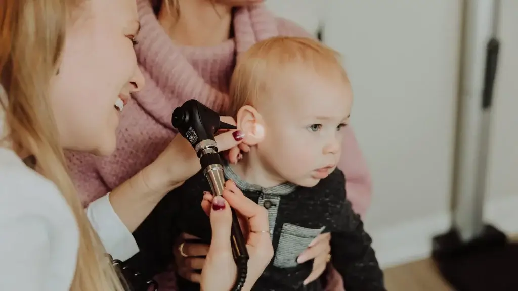 Baby getting treatment on eras | Concierge Family Practice In Zeeland, MI | Wellness Co