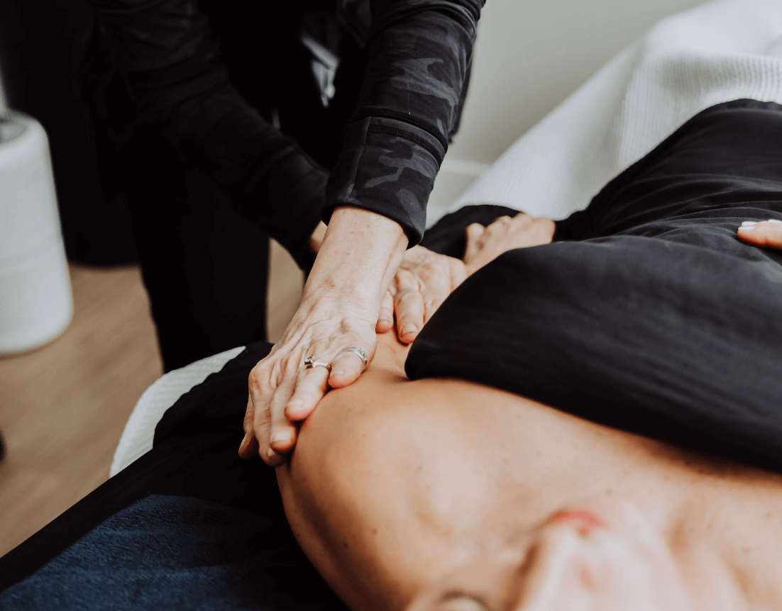 Massage on shoulder given to patient | Wellness Co. | Zeeland, MI